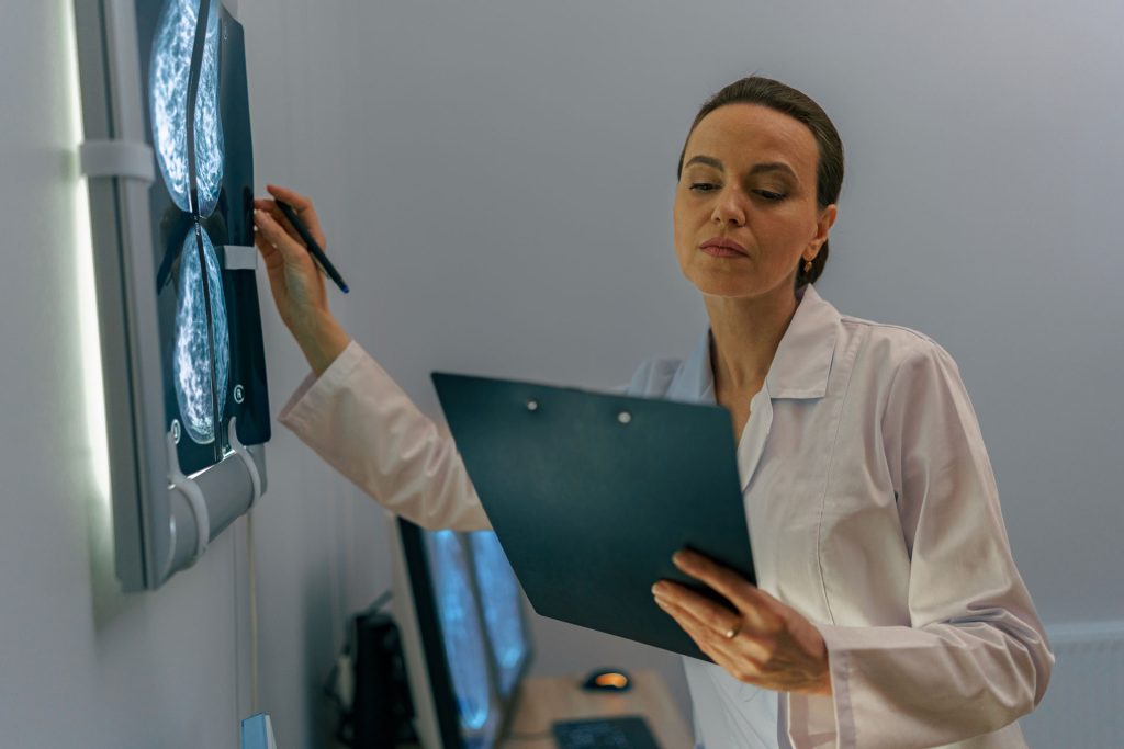 Neurologist looking at MRI scan.