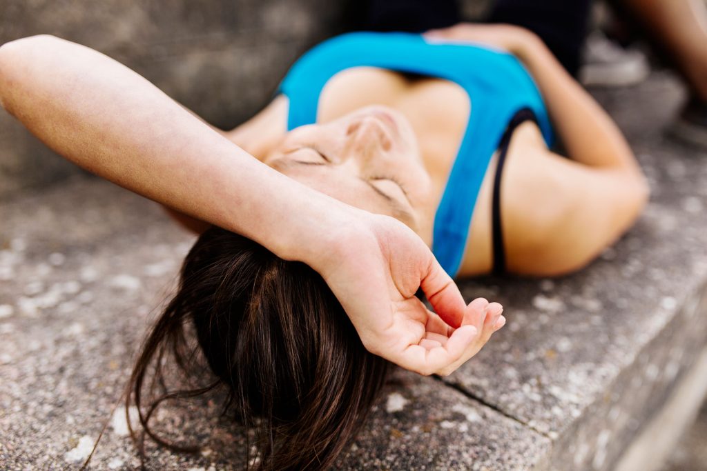 Woman lying on the steps.